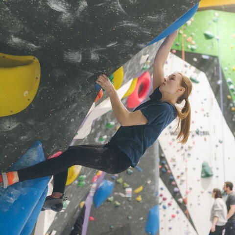Green Spider Climbing One Night Only Disco Boulder Comp