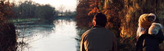 Couple looking over River Wye