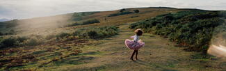 Girl running free on Garway Hill