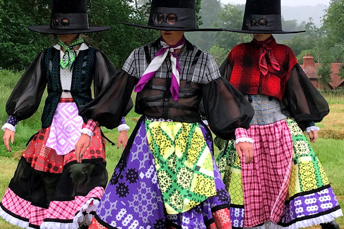 Three women in outfits