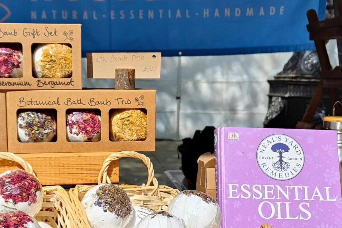 A wide array of natural looking bath bombs on a stall