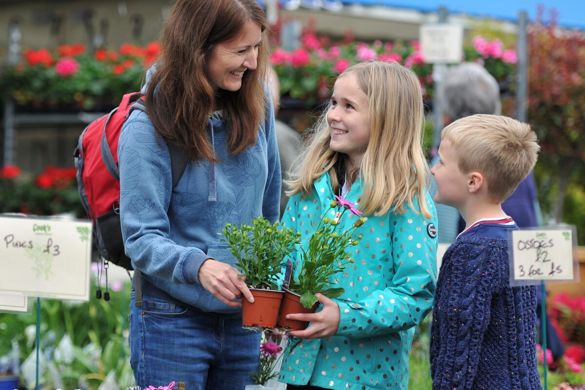 Family enjoying the plants