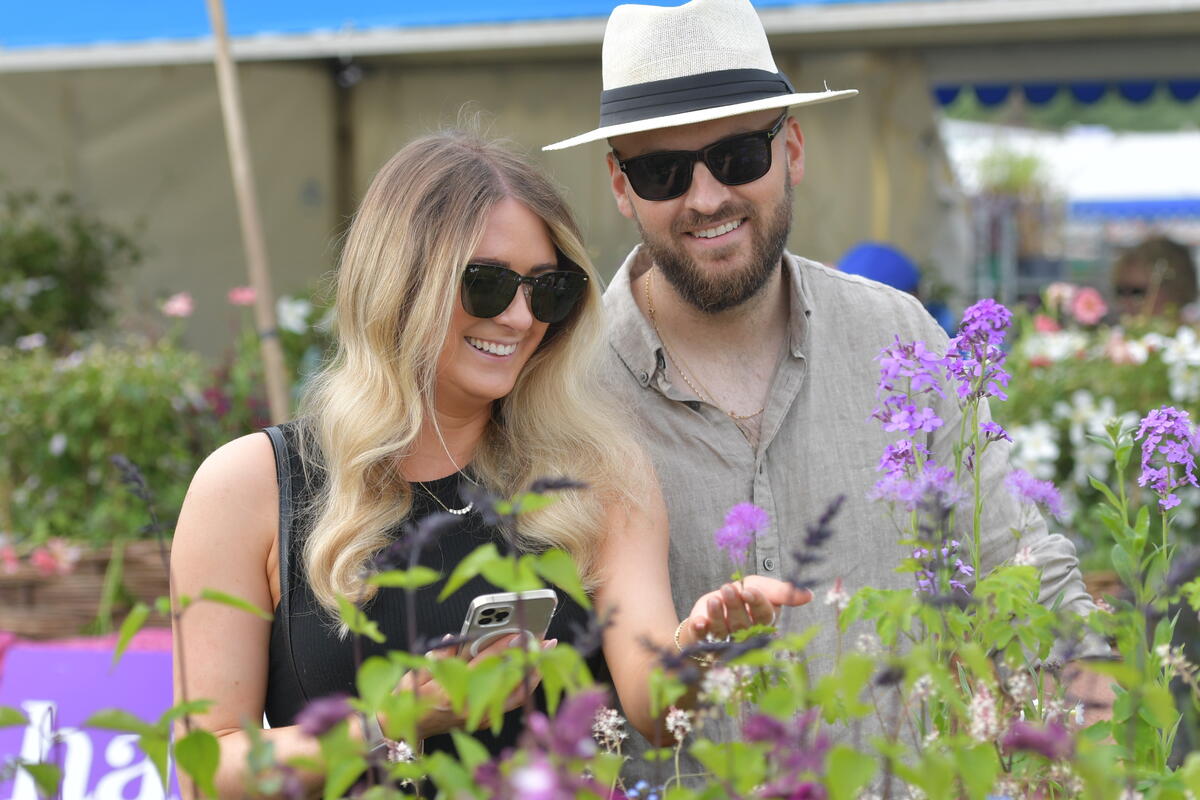 Couple admiring the flowers