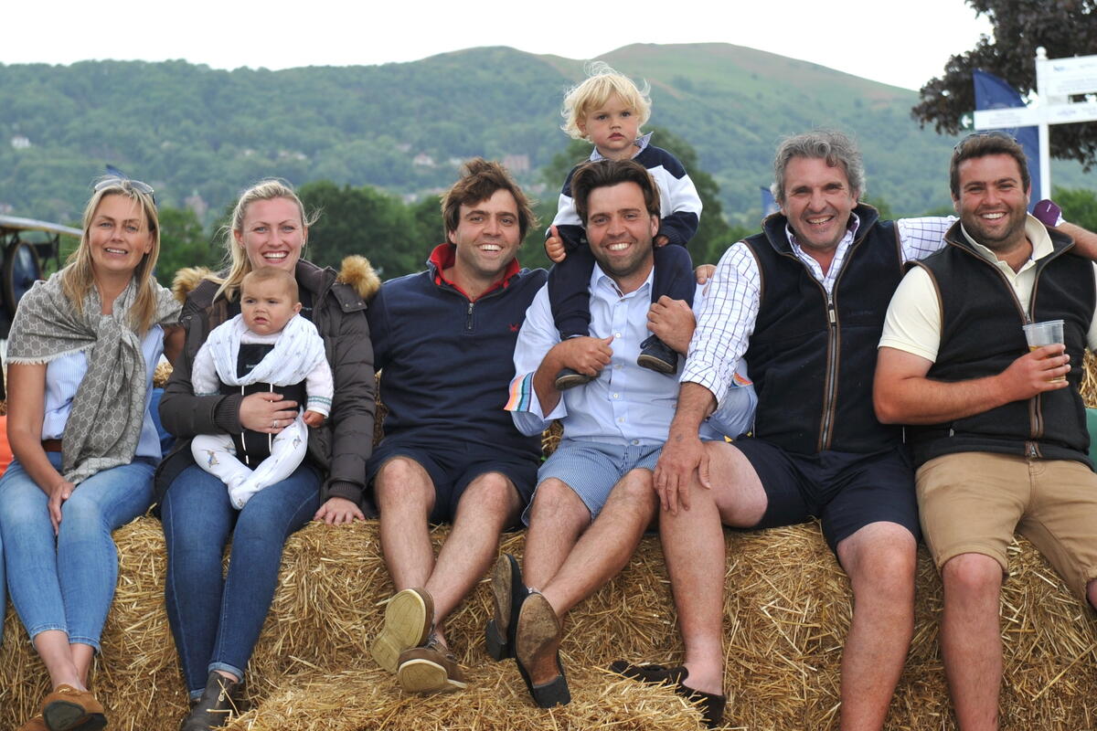 A family of 3 generations enjoying the show