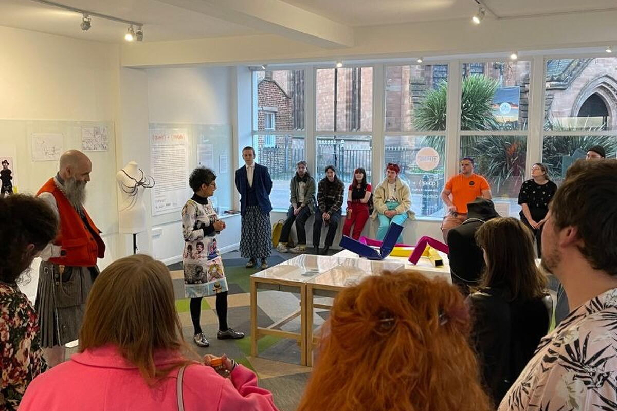 Group of people attending a Ferrous exhibition and workshop