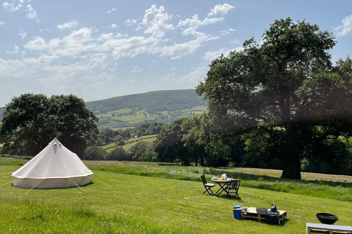 Tent, firepit, picnic table, meadow