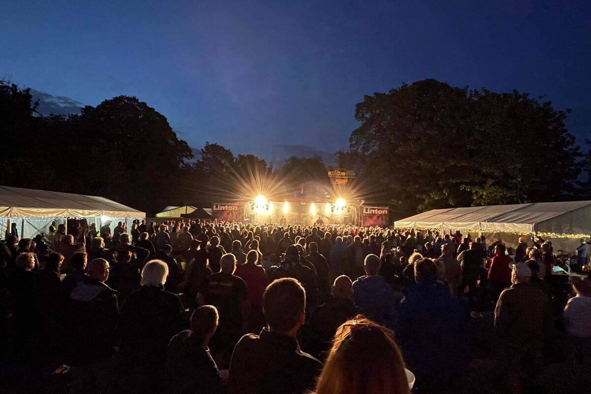 Stage with crowds at night