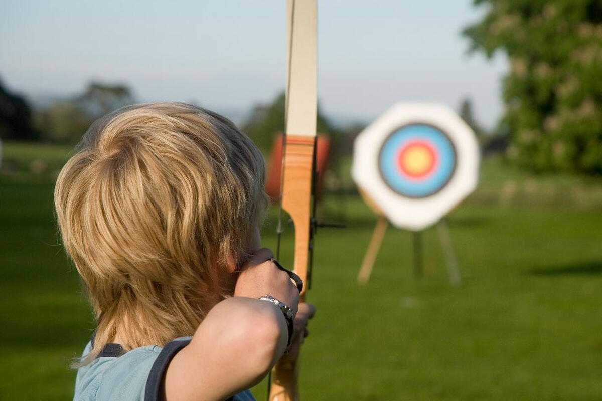 Young people having a go at archery