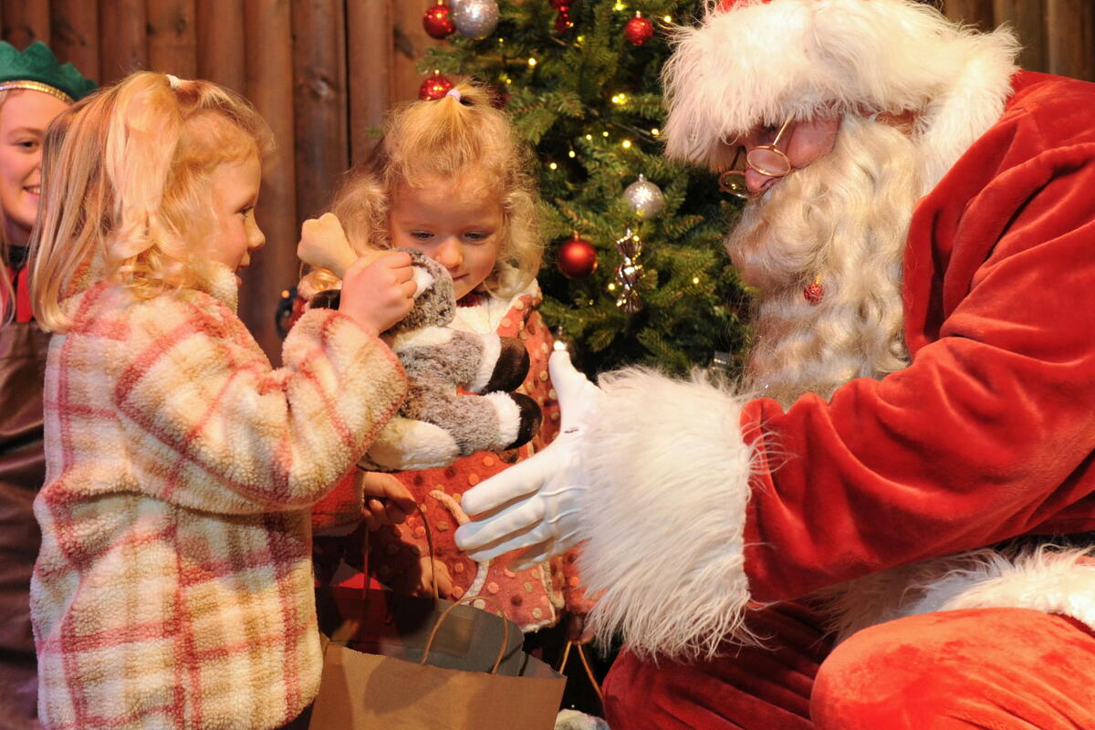 children meeting Santa