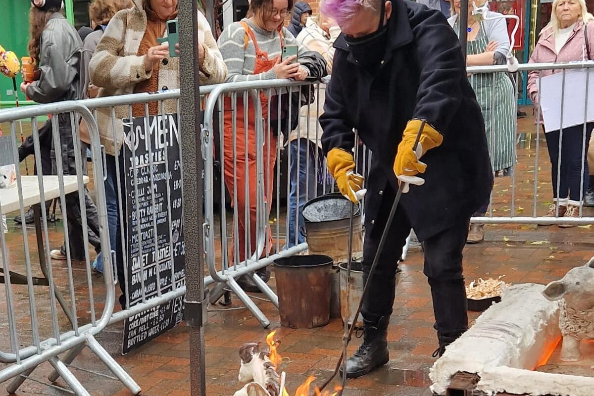 raku pottery being fired as a display outdoors