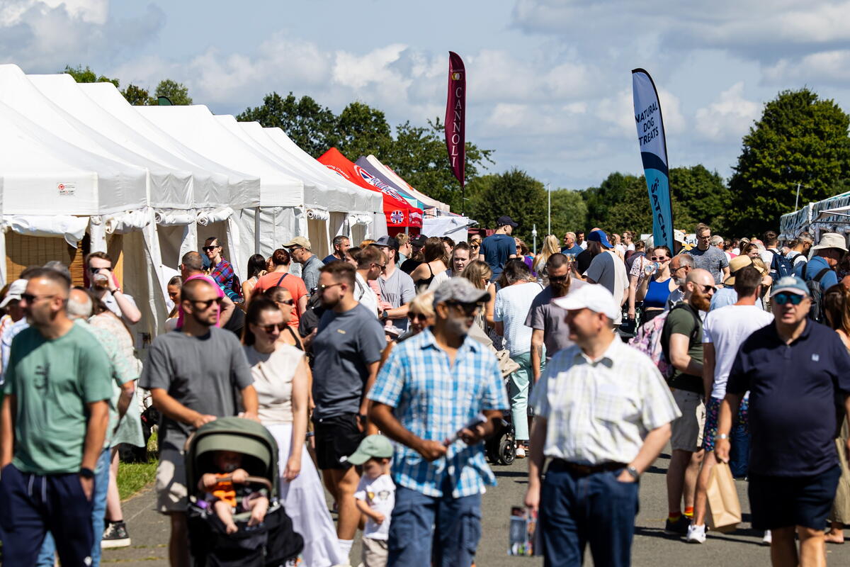 Crowds and food tents at an event