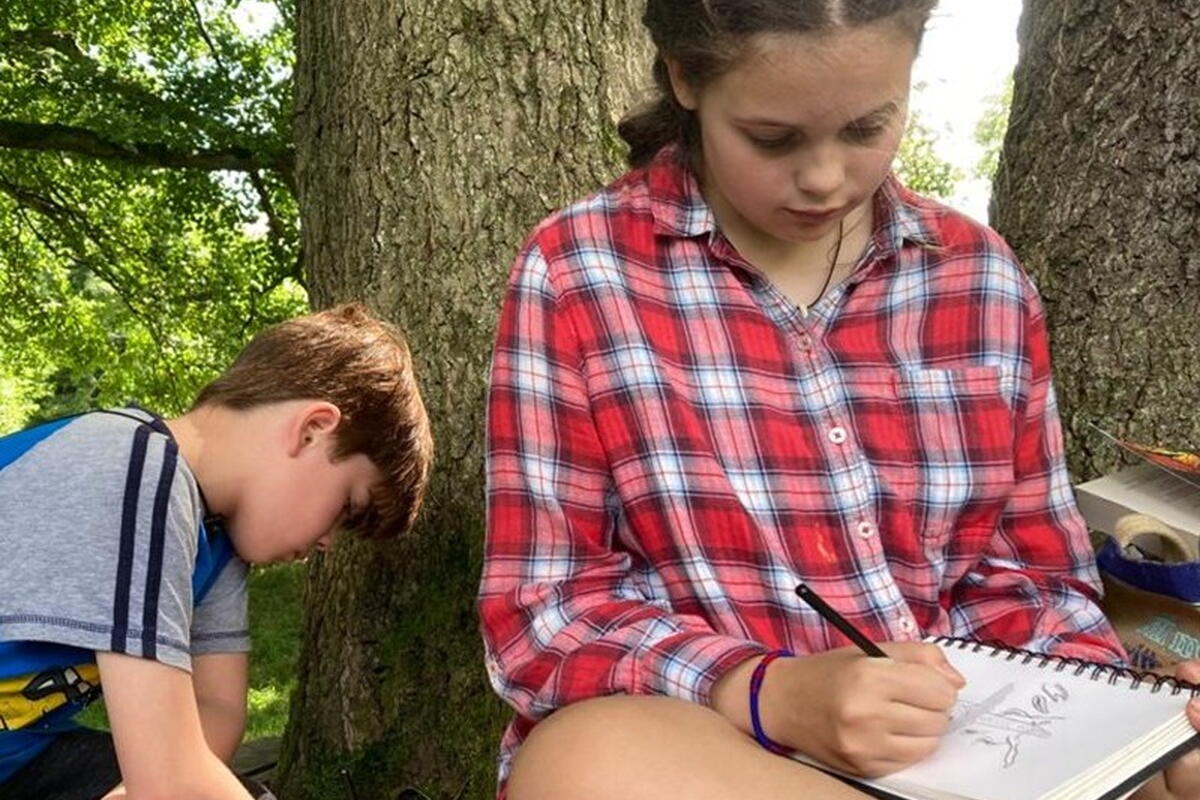 children drawing outside