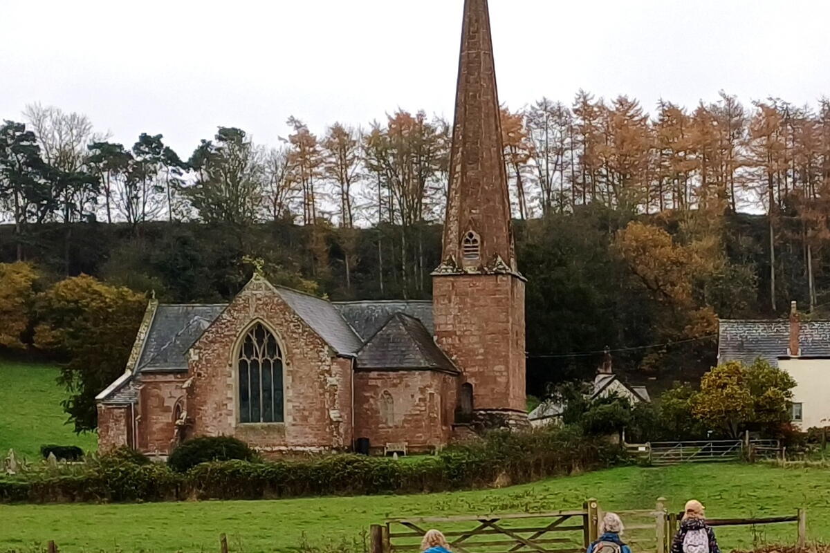 People walking towards a church