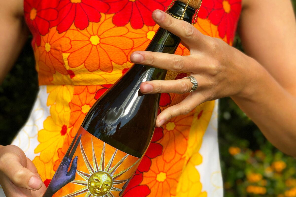 A bottle of Artistraw Cider