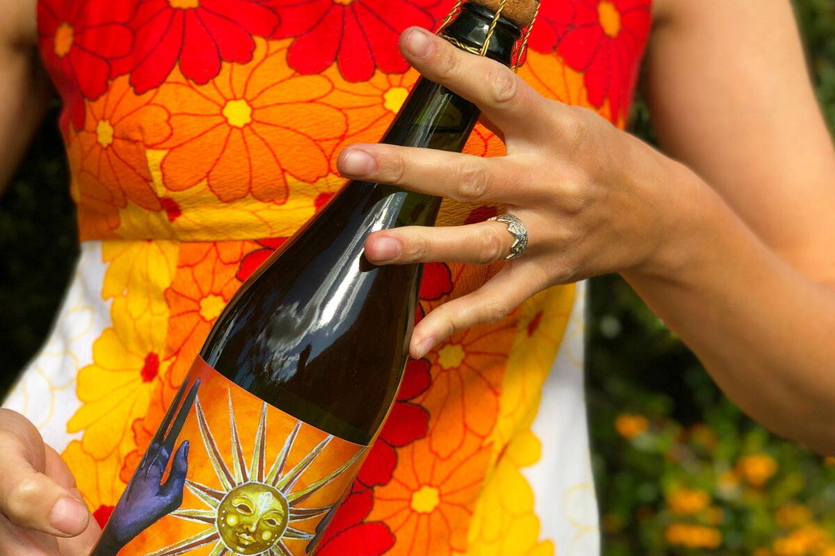 A bottle of Artistraw Cider