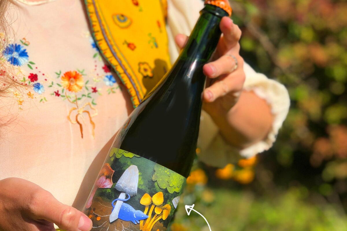 A bottle of Artistraw Cider