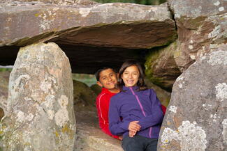 Children playing underneath Arthur's Stone
