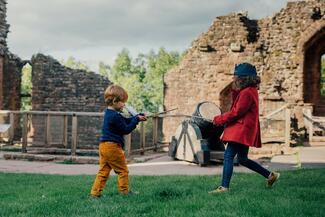Children playing in a castle