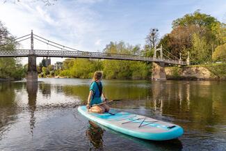 View of Victoria bridge from a paddleboard