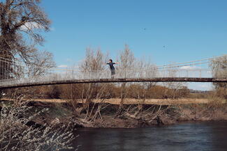 Walking over bridge