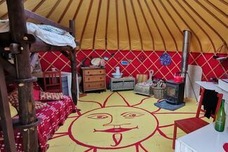 Bright and colourful yurt interior