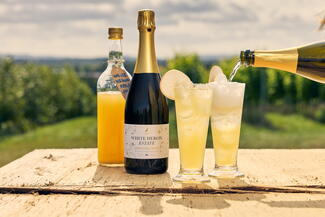 Drinks in front of scenic countryside view