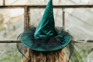 Girl in witches hat