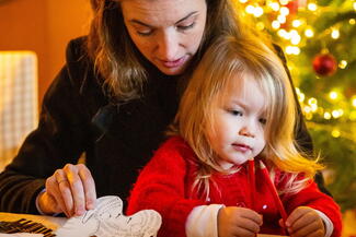 mother and child crafting at christmas