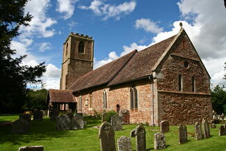 Mathon church and graveyard on a sunny day
