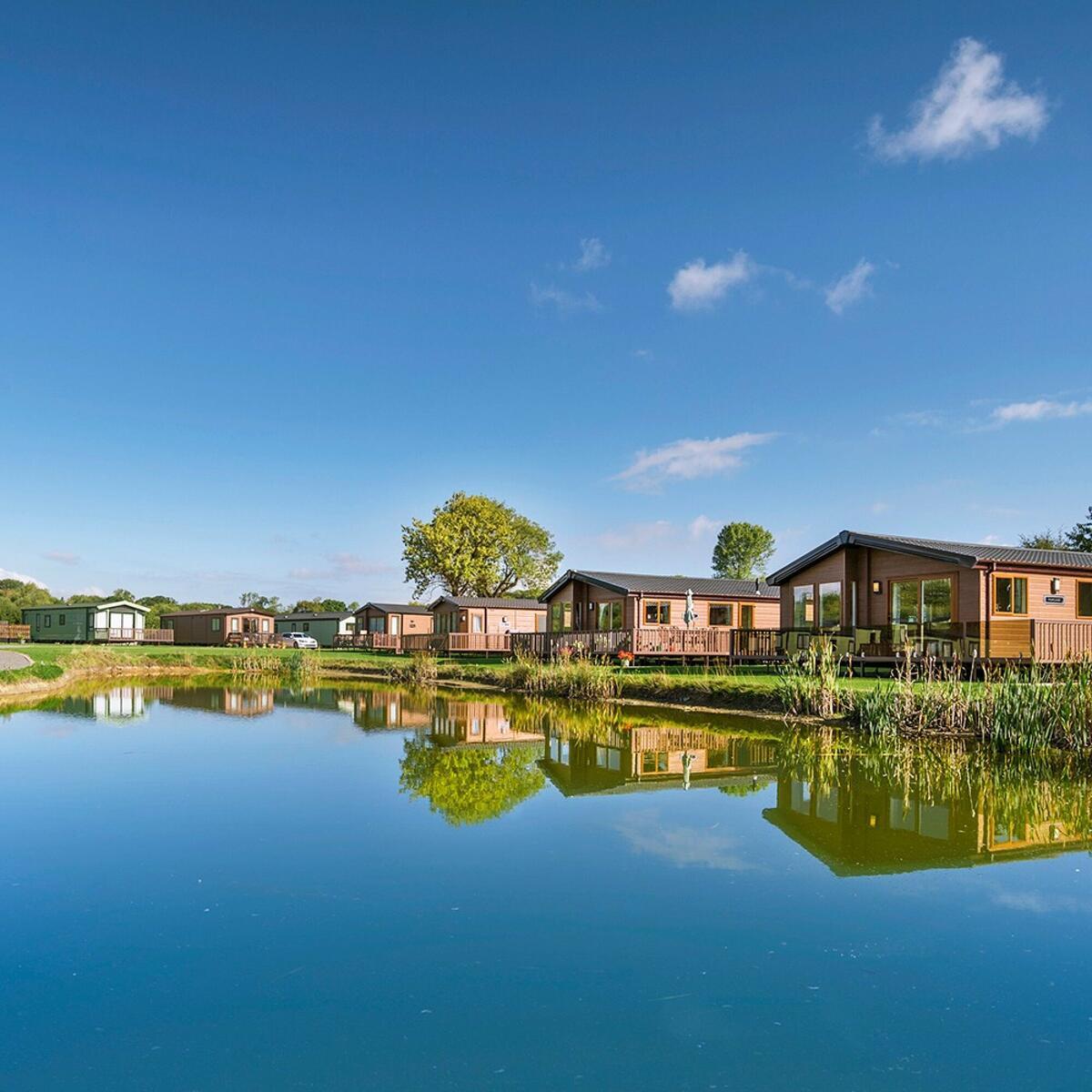 Privately owned lake edge holiday lodges at Arrow Bank