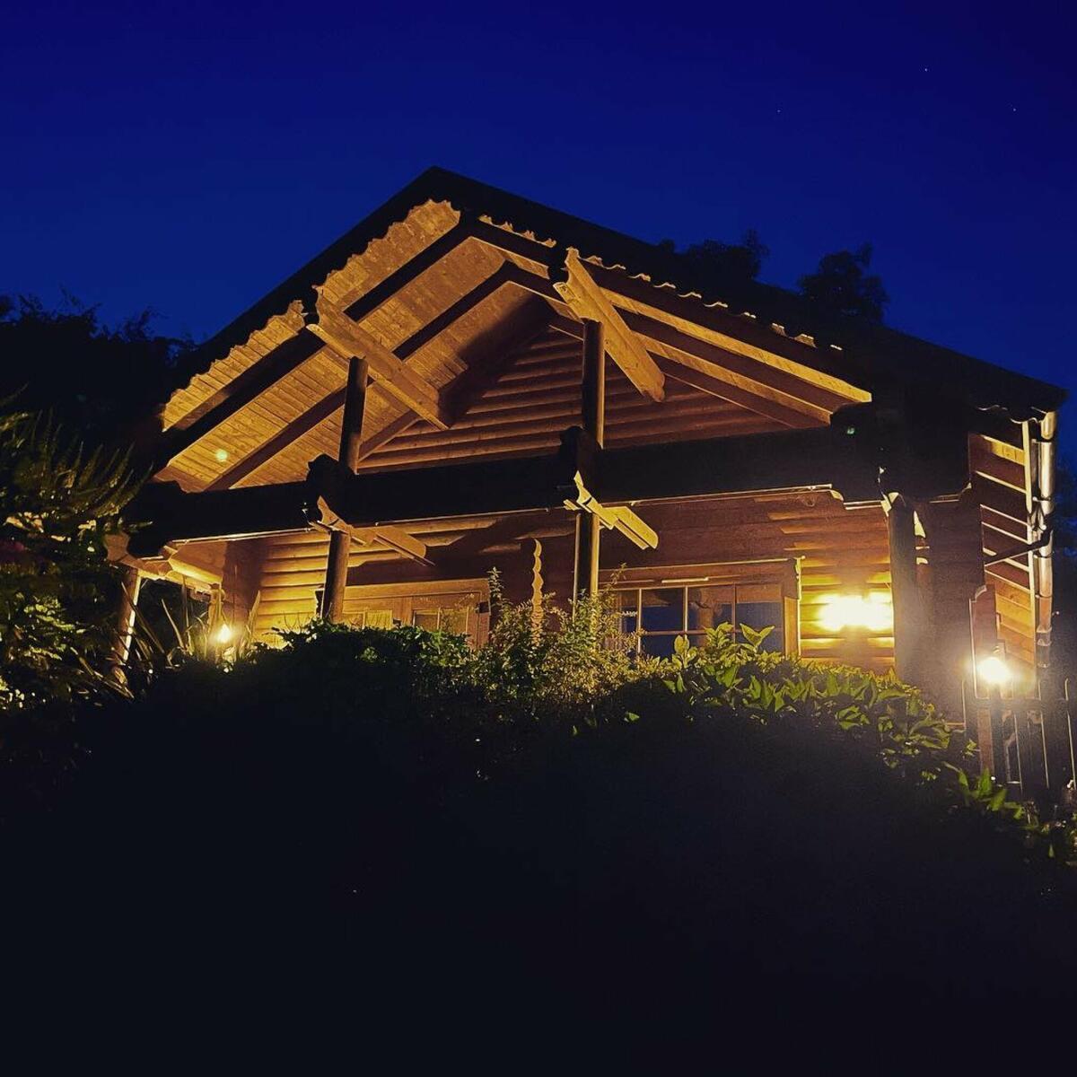 Oak cabin at night