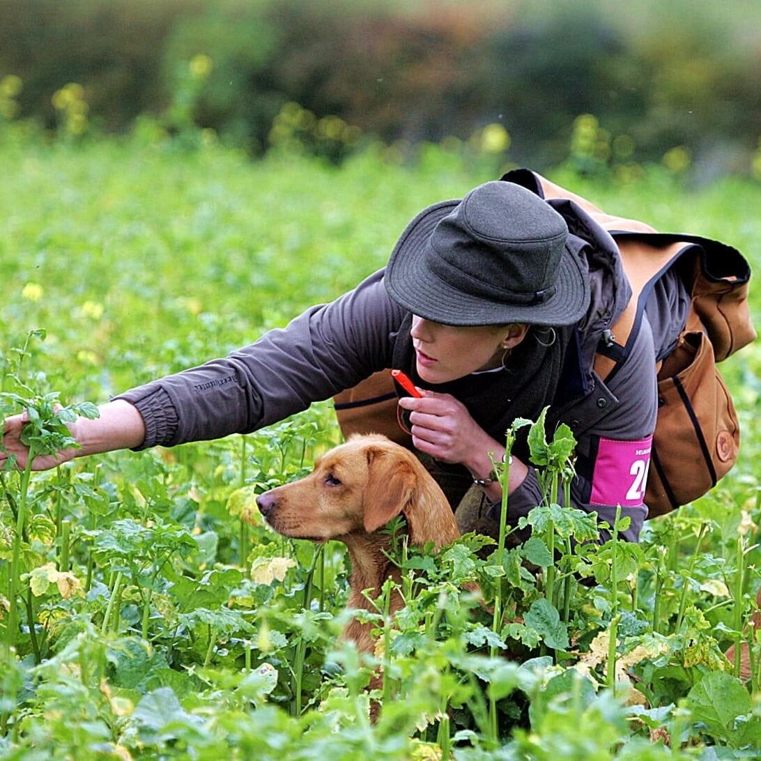 woman with gun dog