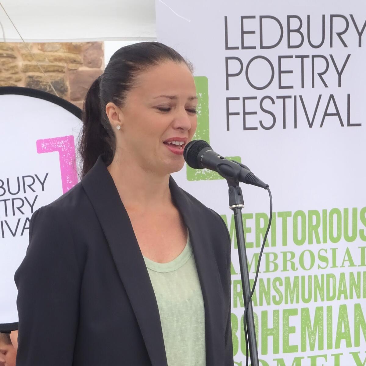 Lady presenting poetry