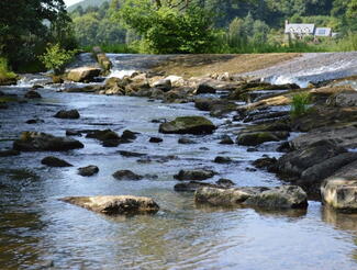 The river running by Riverside Inn, Aymestrey