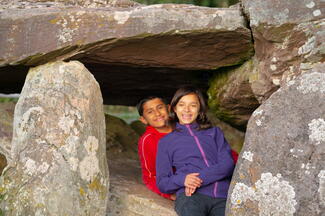 Children playing underneath Arthur's Stone