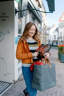 shopping carrying large bag of goods