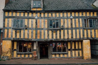 Blank Canvas Antiques, yellow half-timbered building