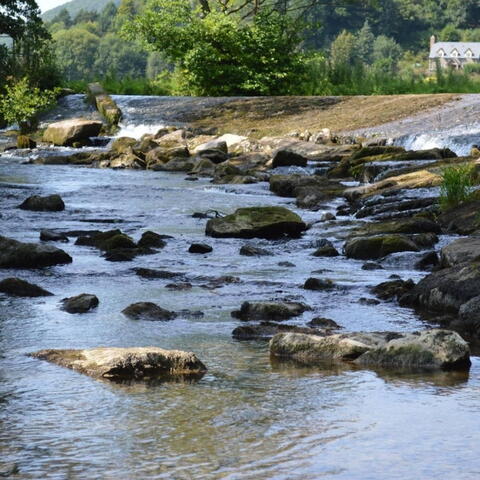 The river running by Riverside Inn, Aymestrey