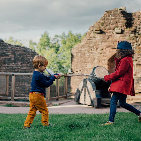 Children playing in a castle