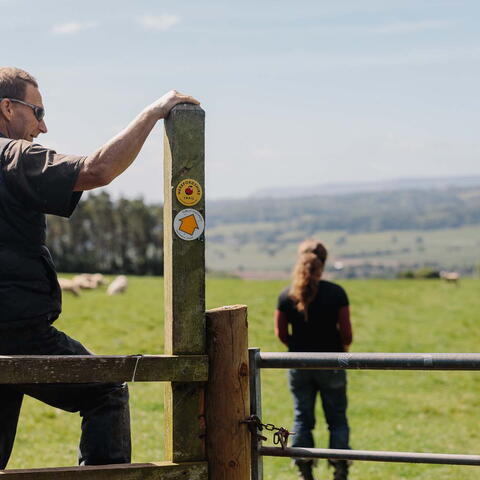 Walkers at Arthur's stone