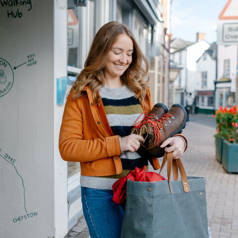 shopping carrying large bag of goods