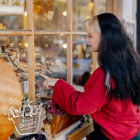 Looking through vintage shop window