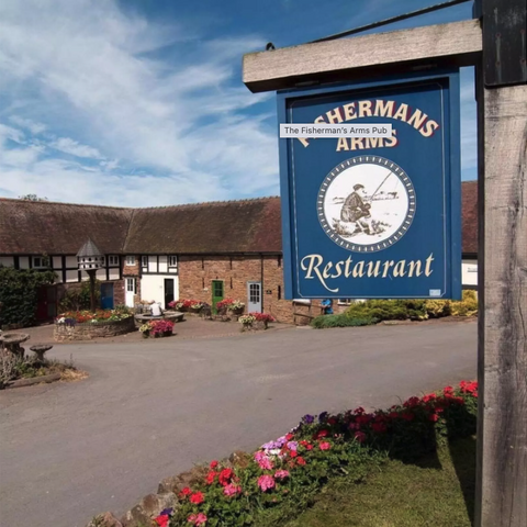 Fishermans Arms sign with pub in the background