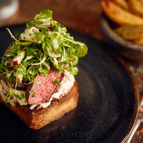 Cut of beef with greenery