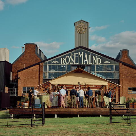 View of a party gathering outside Rosemaund Distillery