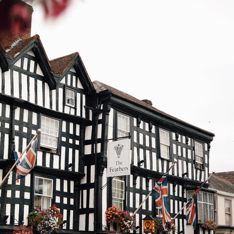 Black and White building flying Union Flag