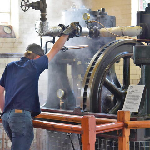 Man working the Steam Engines