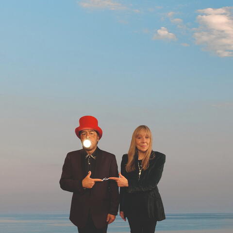 Man and a woman at a beach photo