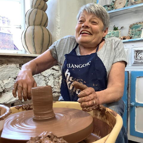 Person on the Potters Wheel