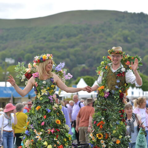 People Dressed in Flowers